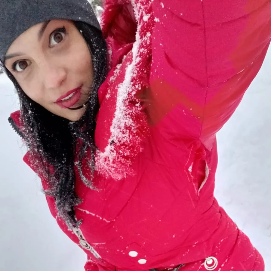 anaworld69 posing in the snow wearing pink ski jacket in snowy outdoors