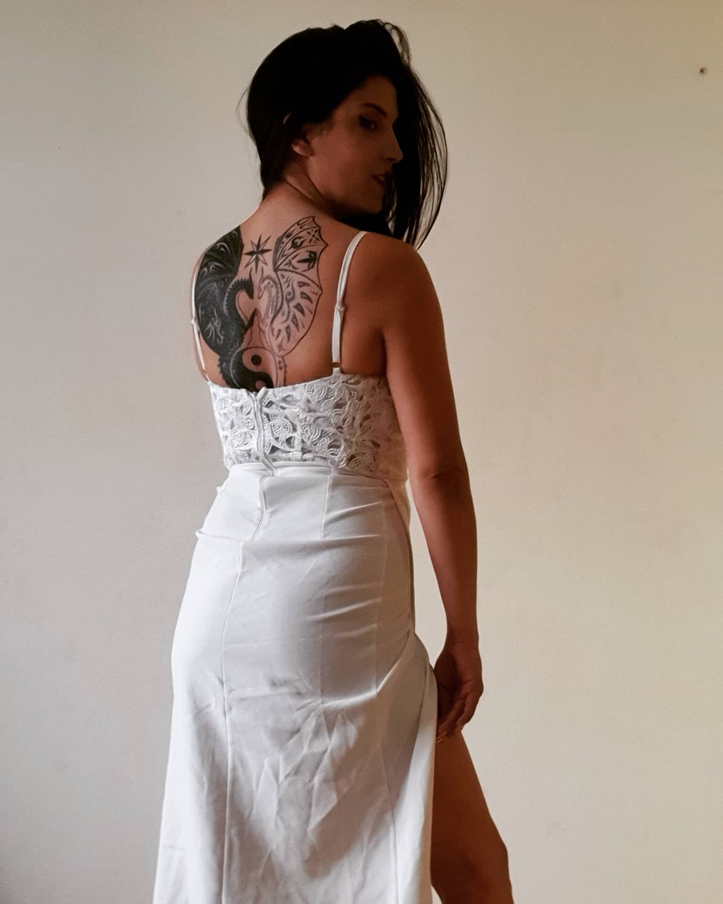 anaworld69 wearing white dress in plain background