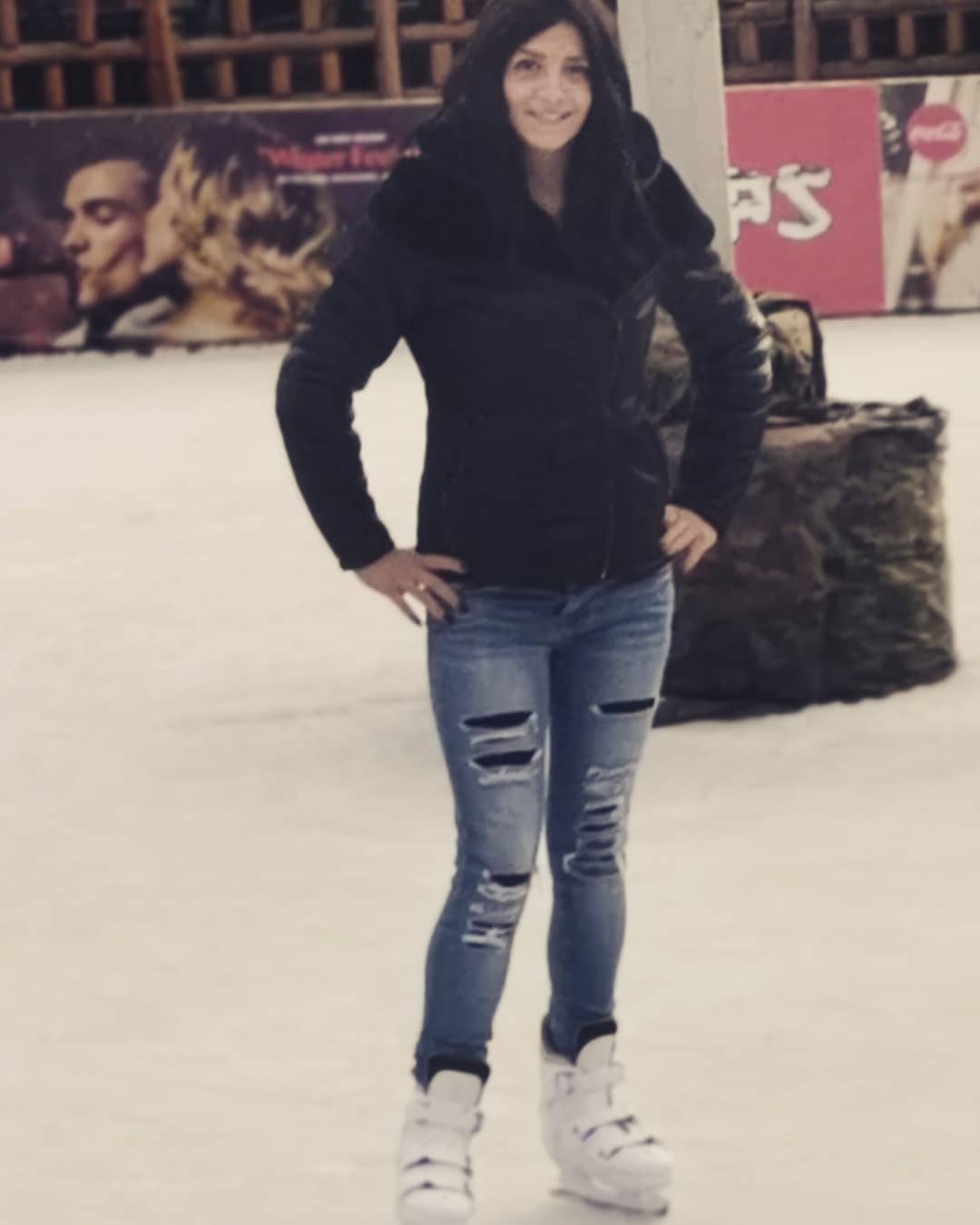 anaworld69 standing on an ice rink wearing black hooded jacket in ice rink