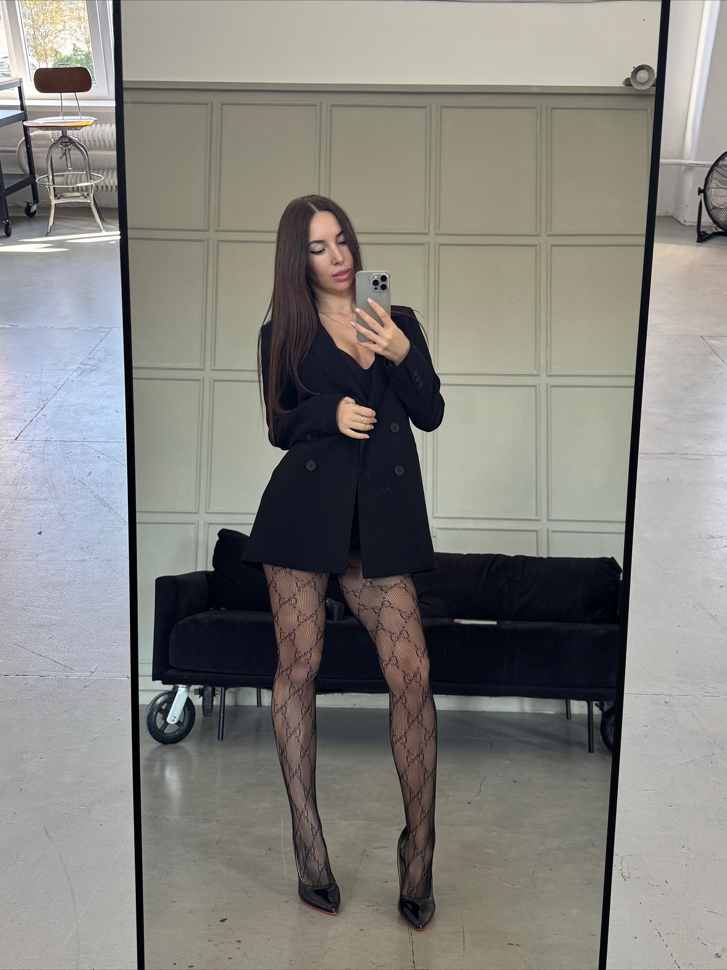 anny54784 taking a mirror selfie wearing black blazer in studio room