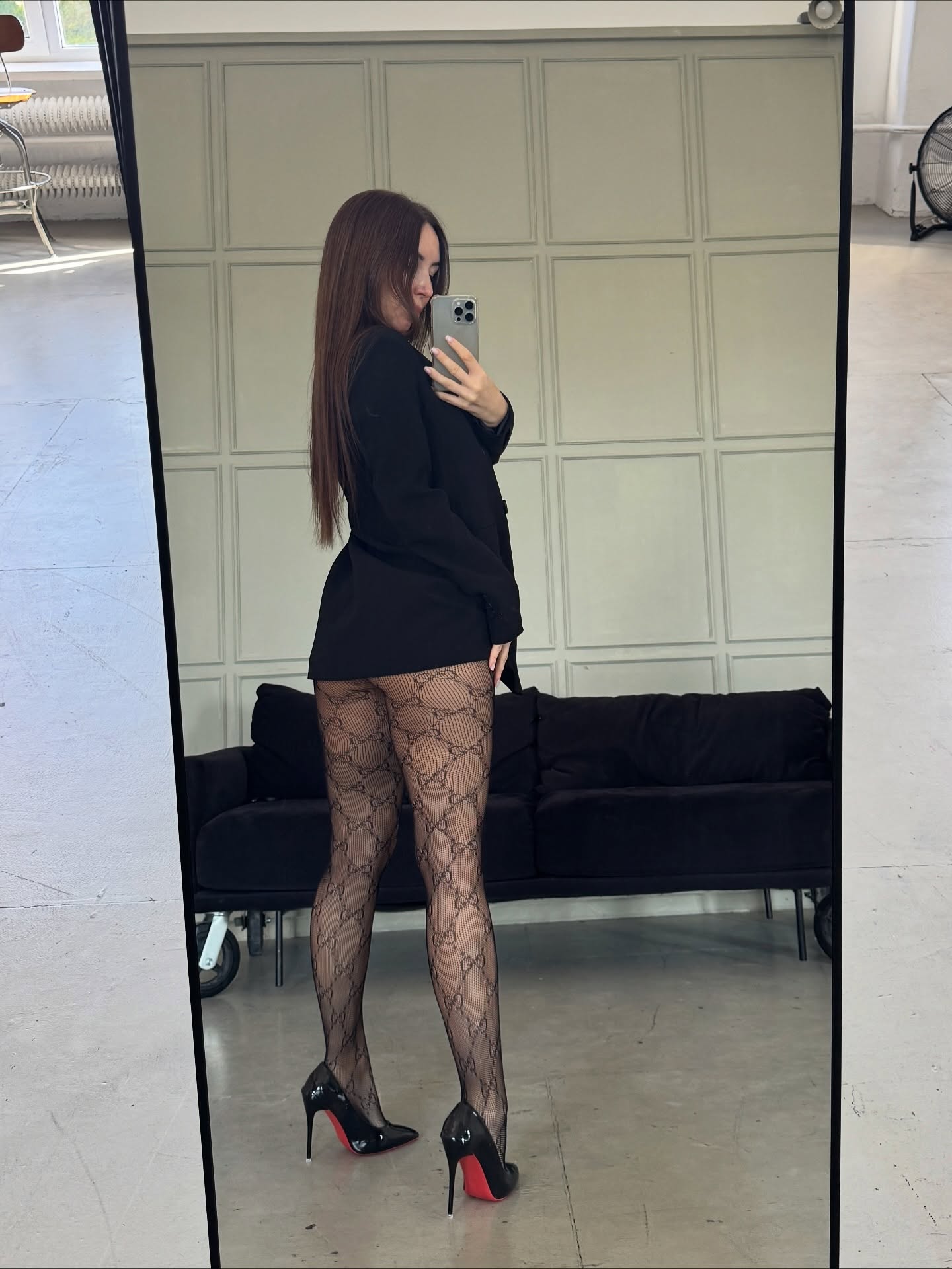 anny54784 taking a mirror selfie wearing black blazer in studio