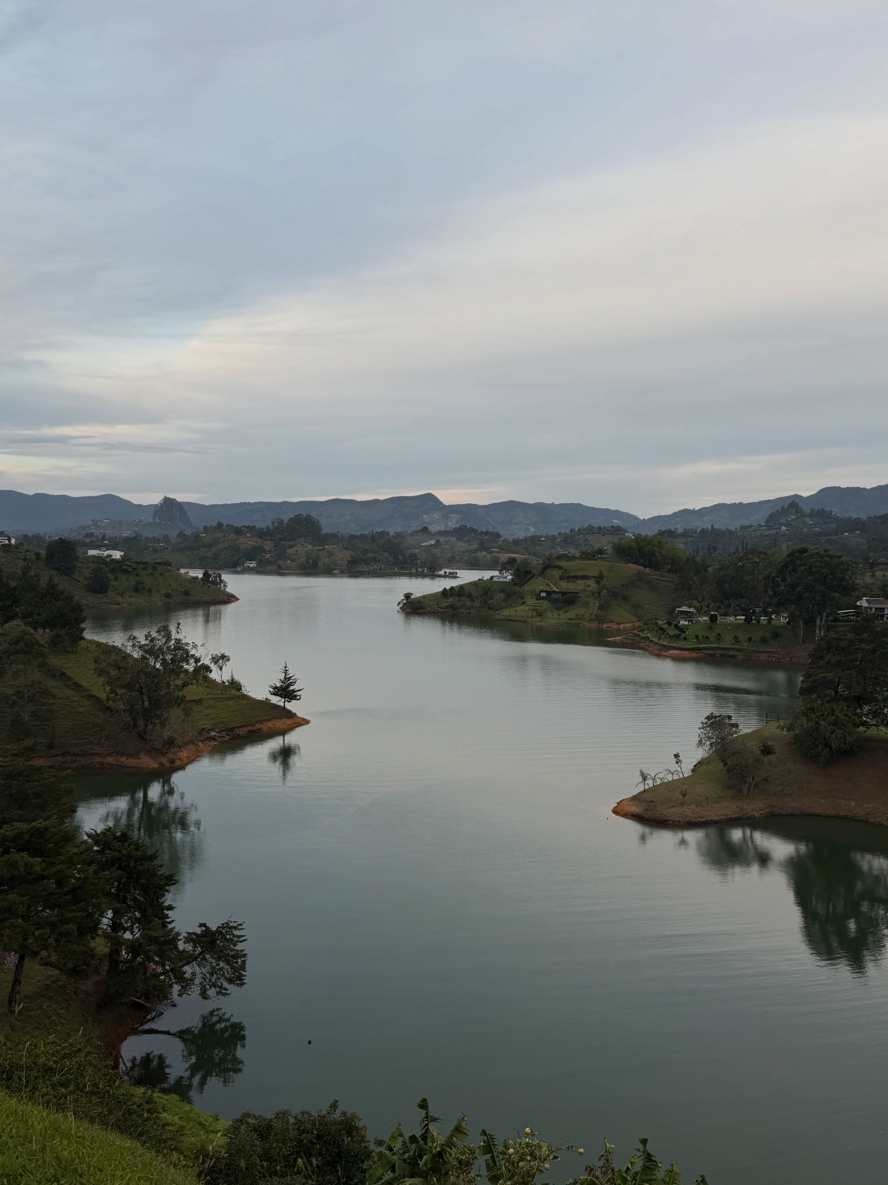 ashley_ospino in lake and green hills at Guatapé Reservoir