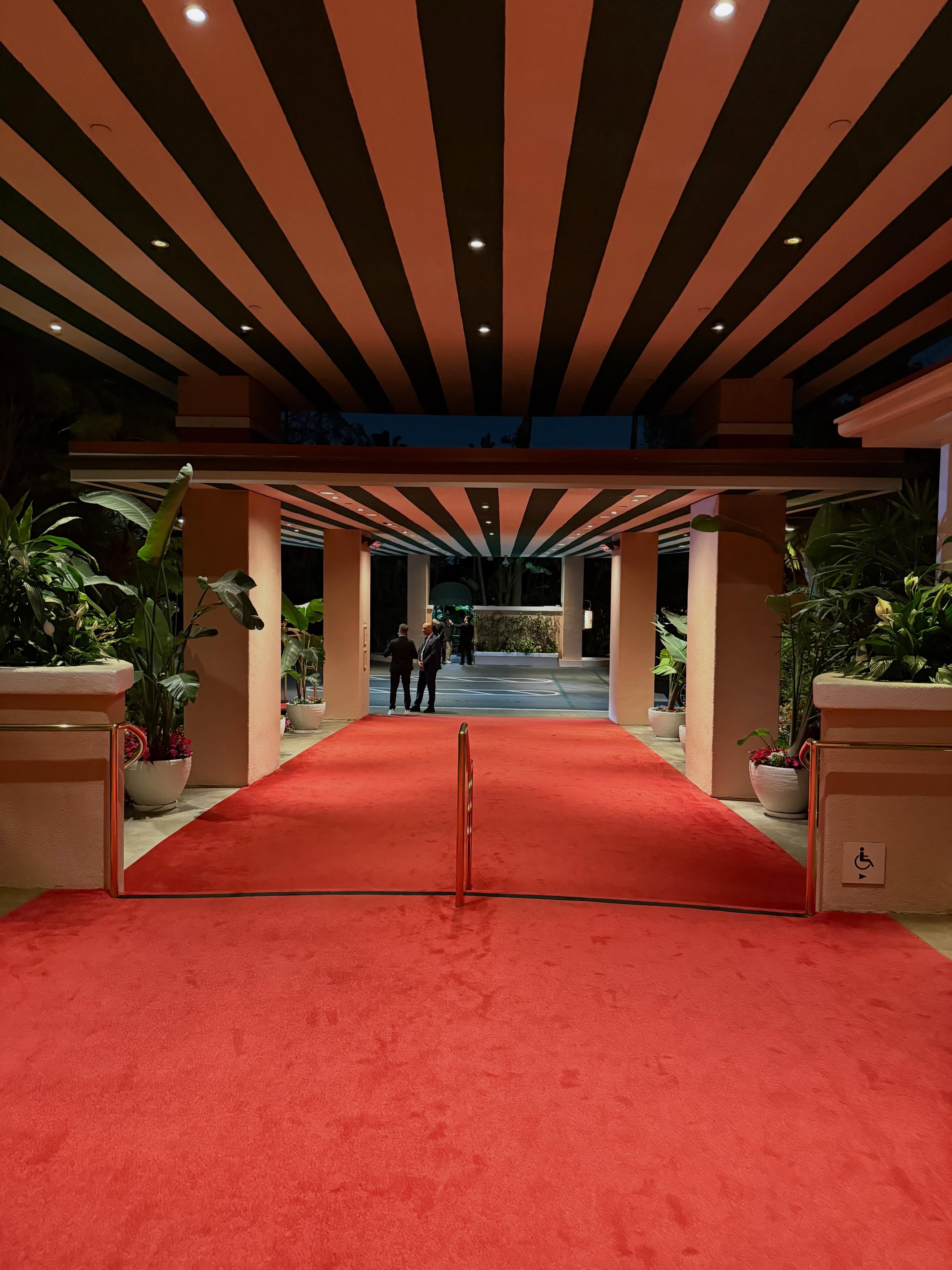 aviebby in hotel entrance portico at Beverly Hills Hotel