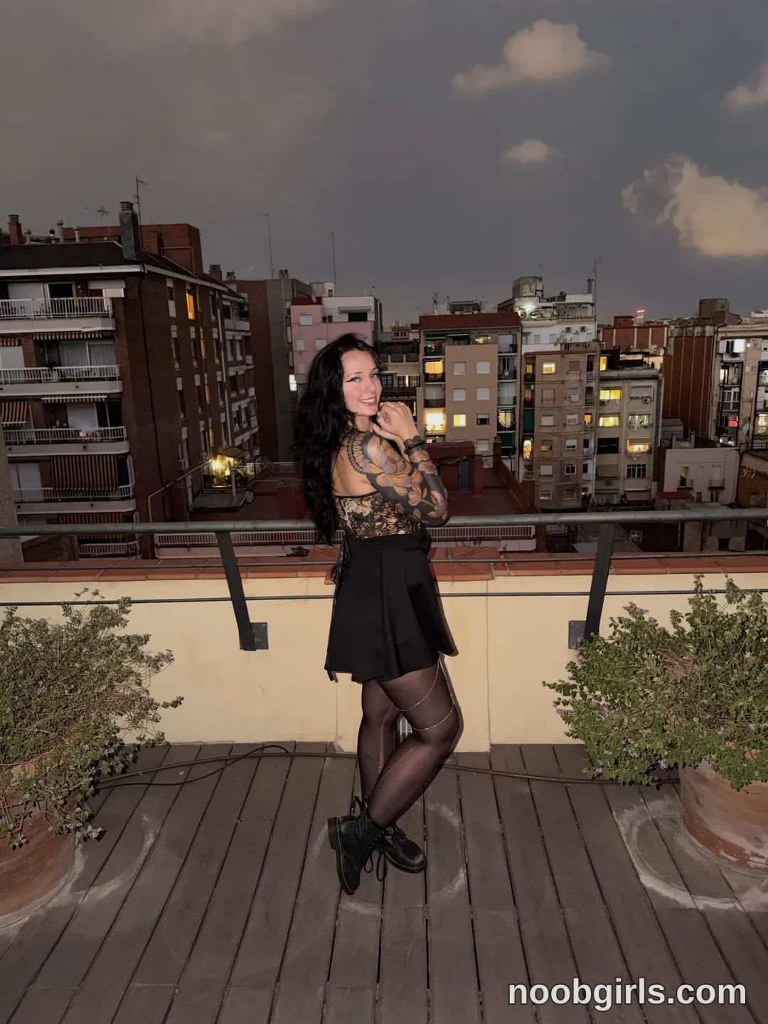 bexbex945874 wearing patterned corset top in rooftop balcony