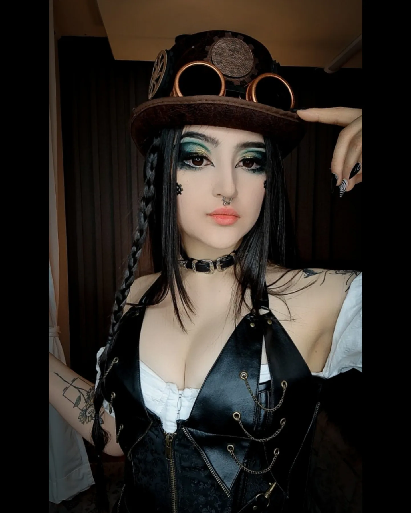 charlotte_germanotta_ wearing brown steampunk hat