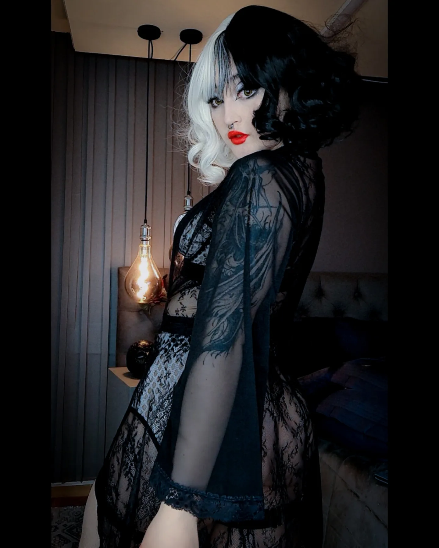 charlotte_germanotta_ looking over shoulder wearing black lace robe in bedroom
