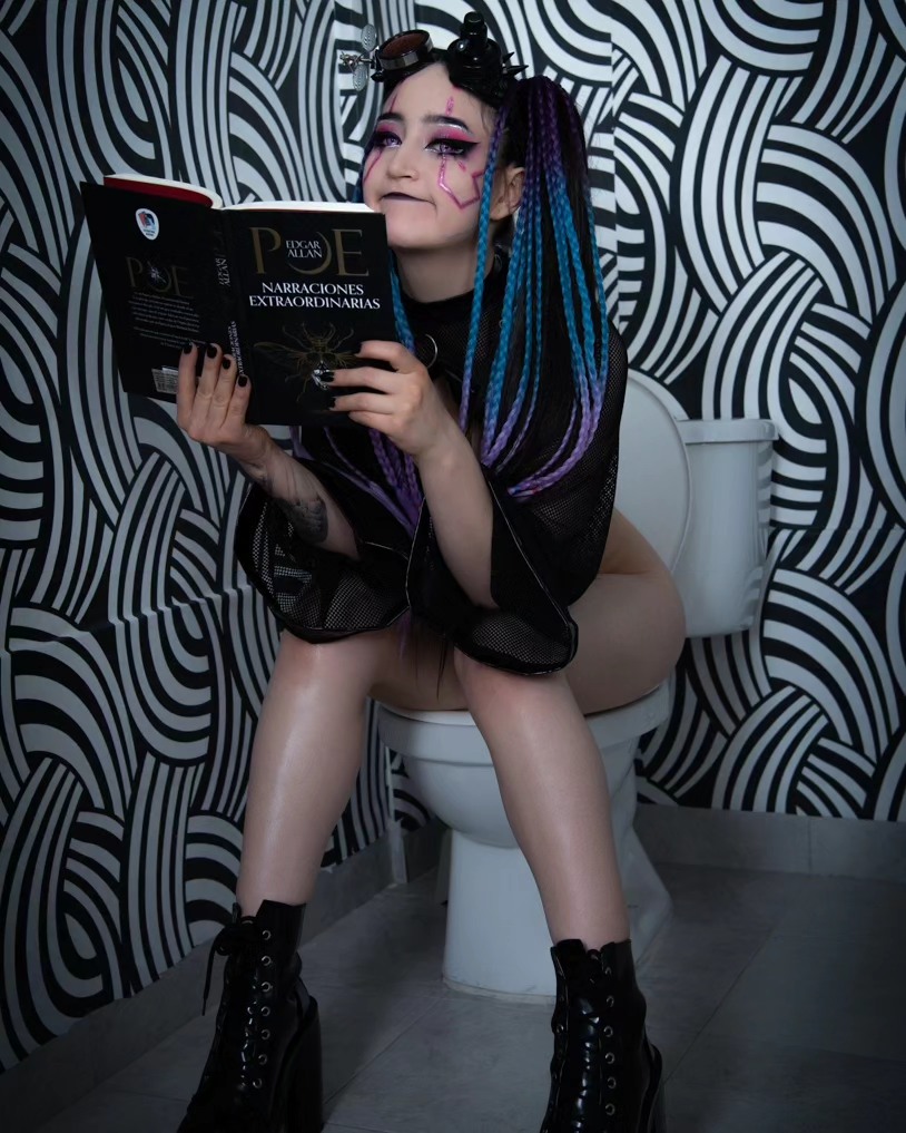 charlotte_germanotta_ reading a book wearing black mesh top in bathroom