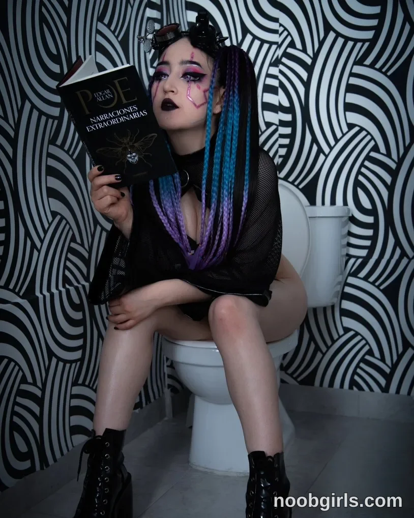 charlotte_germanotta_ Sitting on the toilet with her legs apart wearing Black mesh long-sleeved garment over black clothing