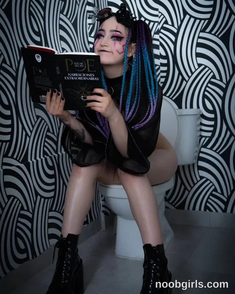 charlotte_germanotta_ sitting on the toilet wearing Black top in bathroom
