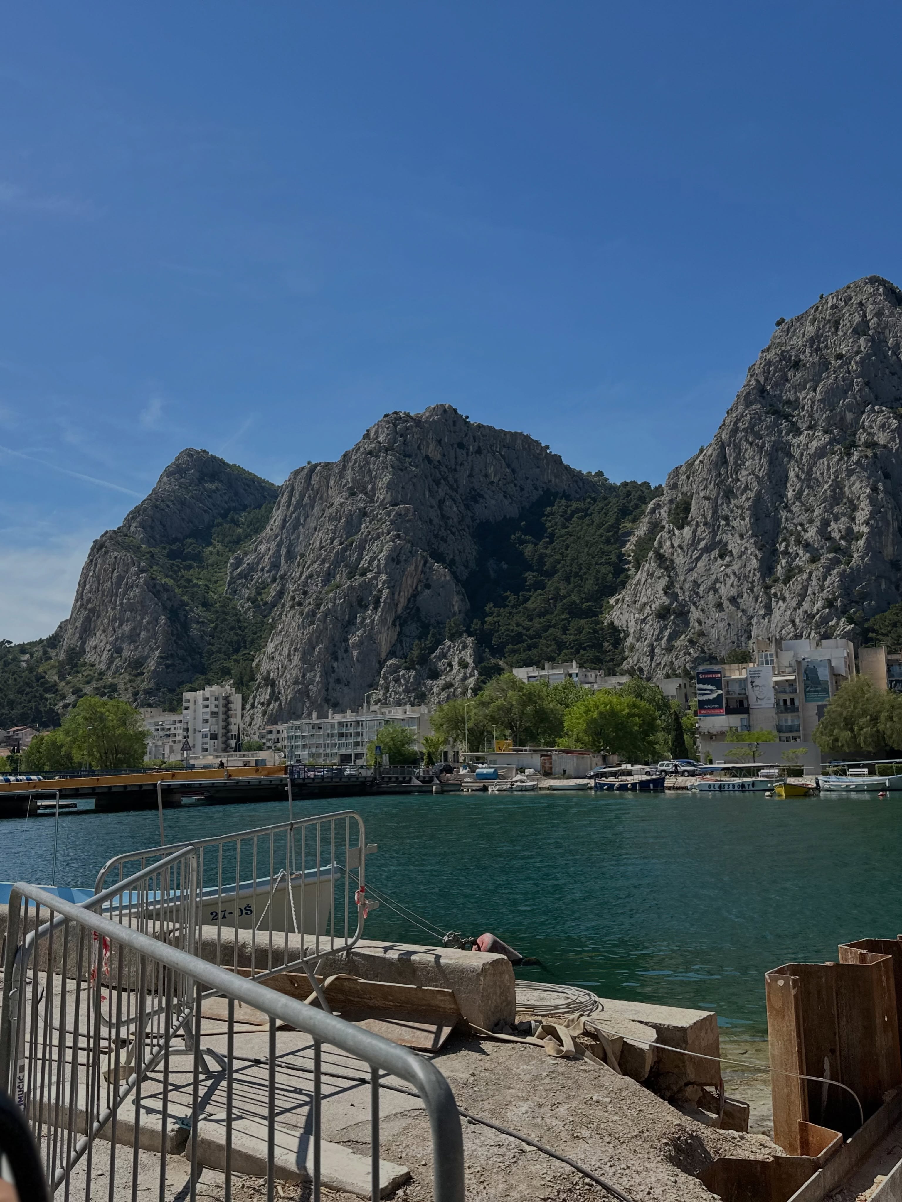 conymegan in waterfront harbor at Omiš