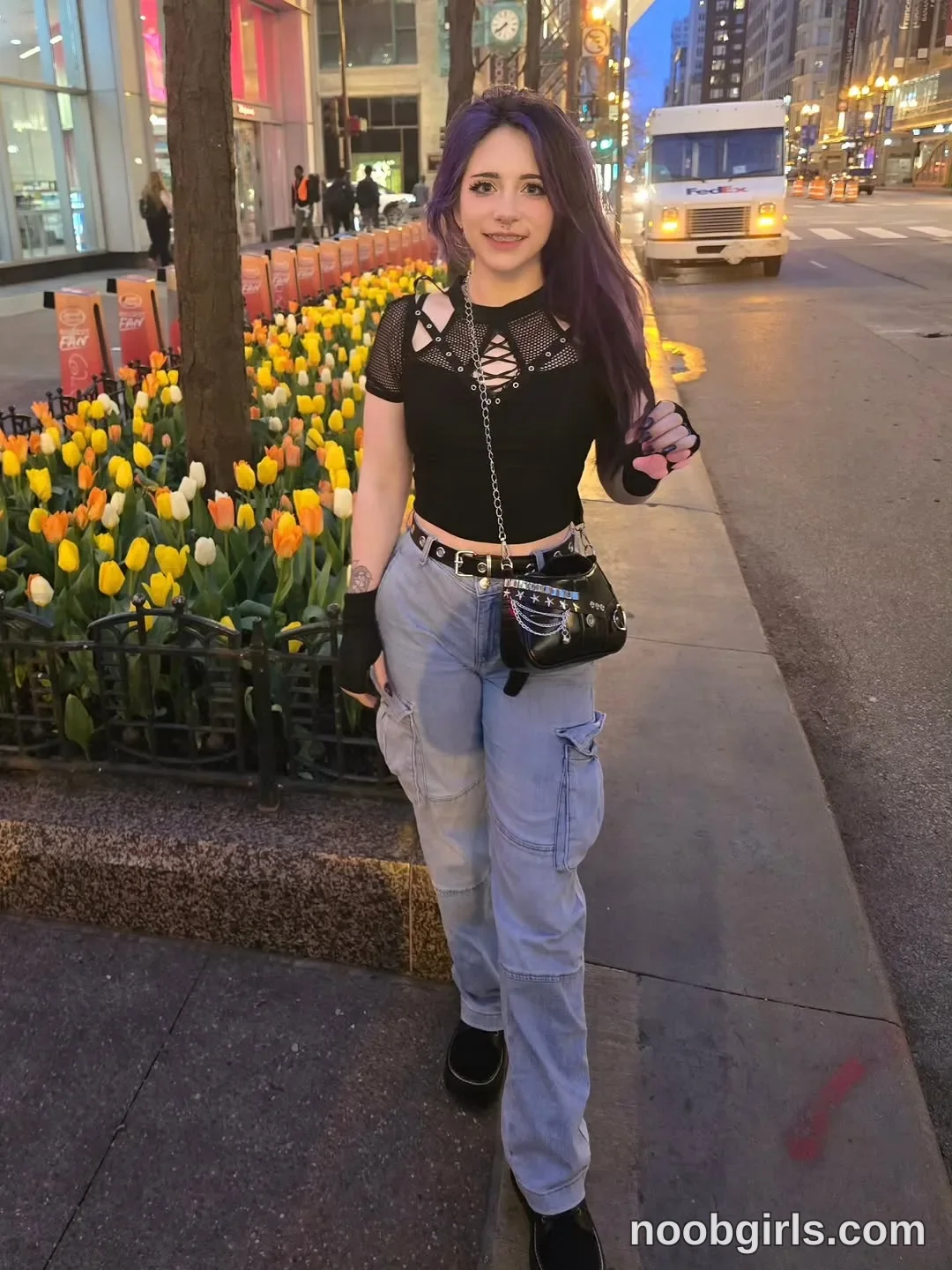 Crimson Kitten Facing the camera with one foot forward