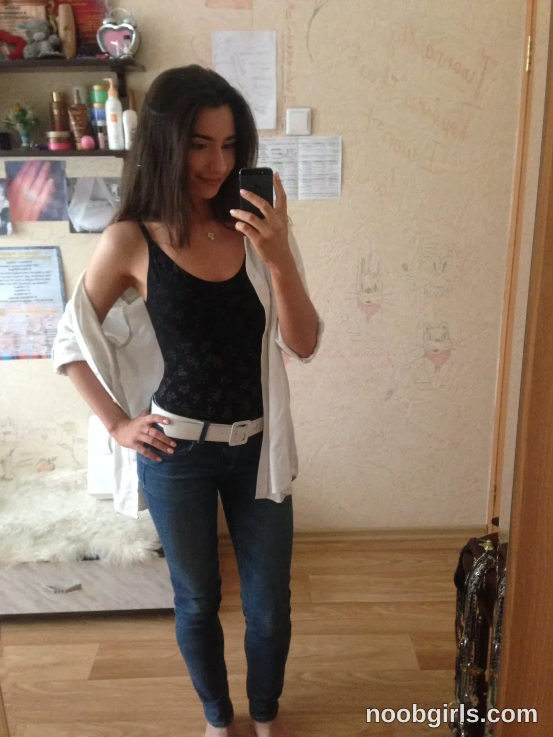 crystalnut taking a mirror selfie wearing black tank top in bedroom