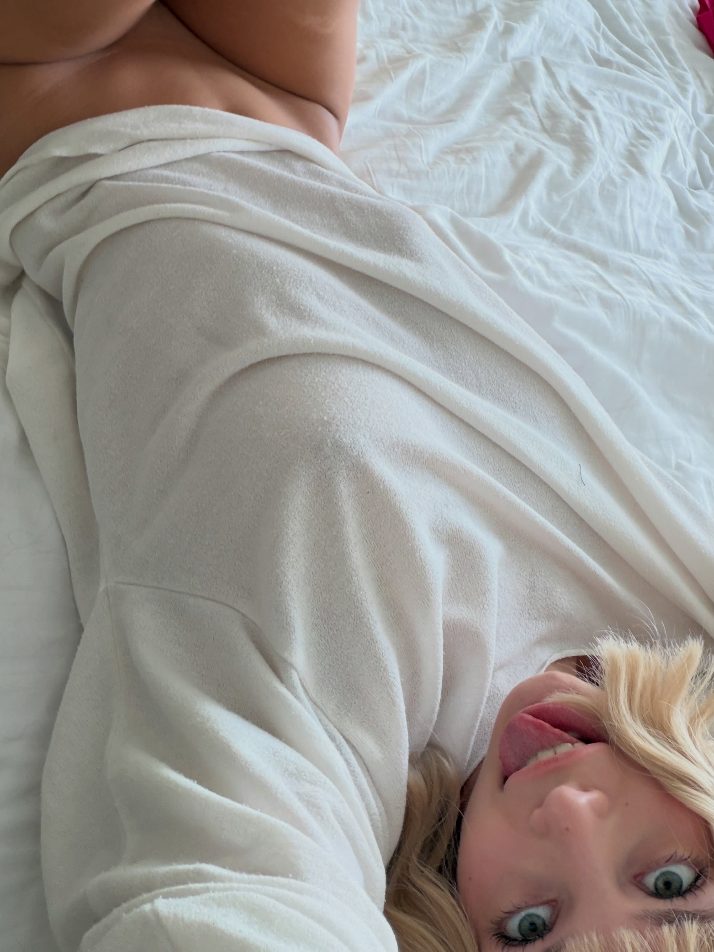 cutieeeeva lying on bed wearing white top in bed