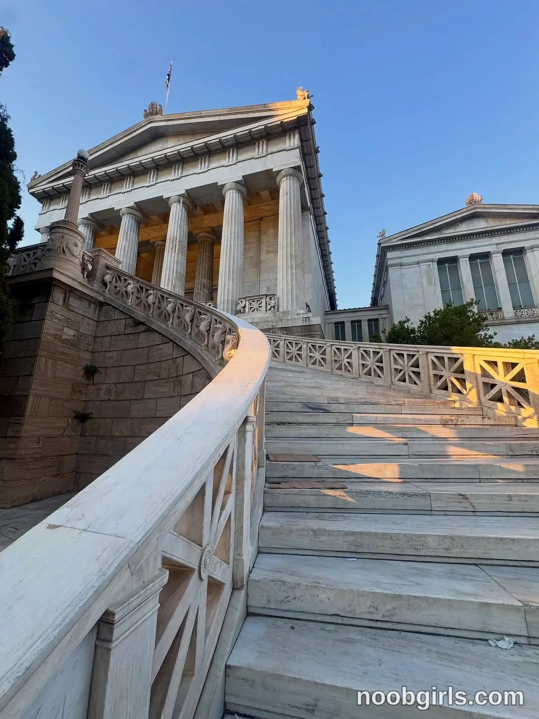 deniseglows No person is visible in marble staircase leading to a columned stone building in Athens, Greece