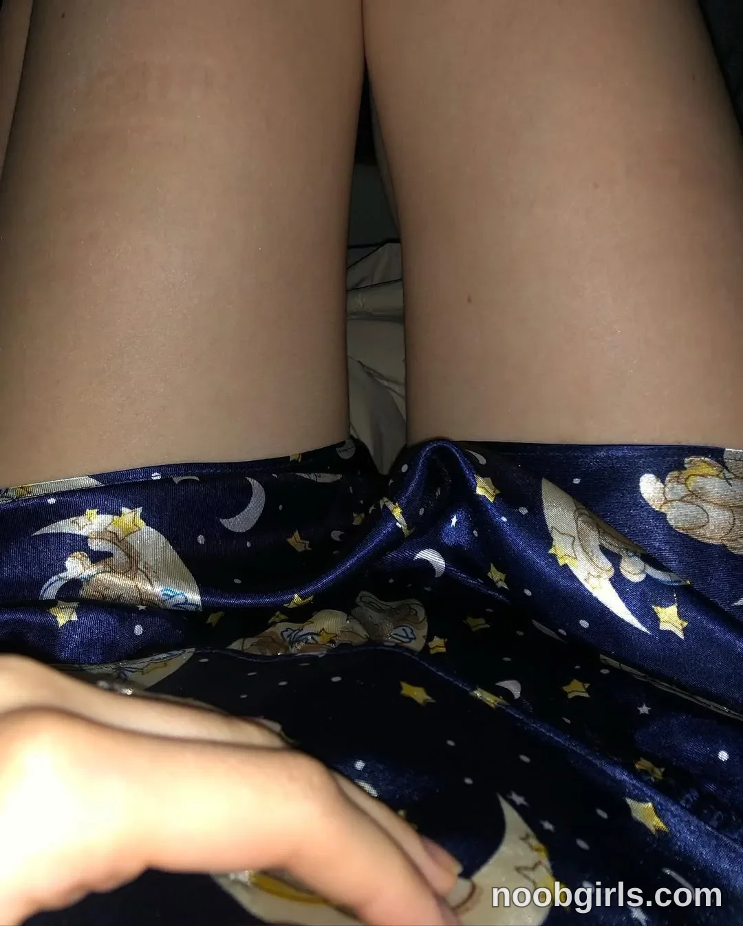 Eff Her legs are positioned side by side