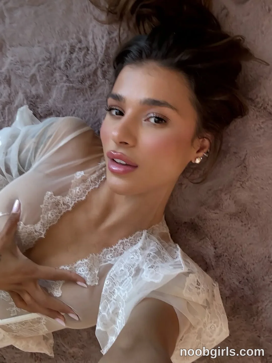 LennaGoddess Lying on her back wearing Sheer ivory garment with white floral lace trim and short sleeves