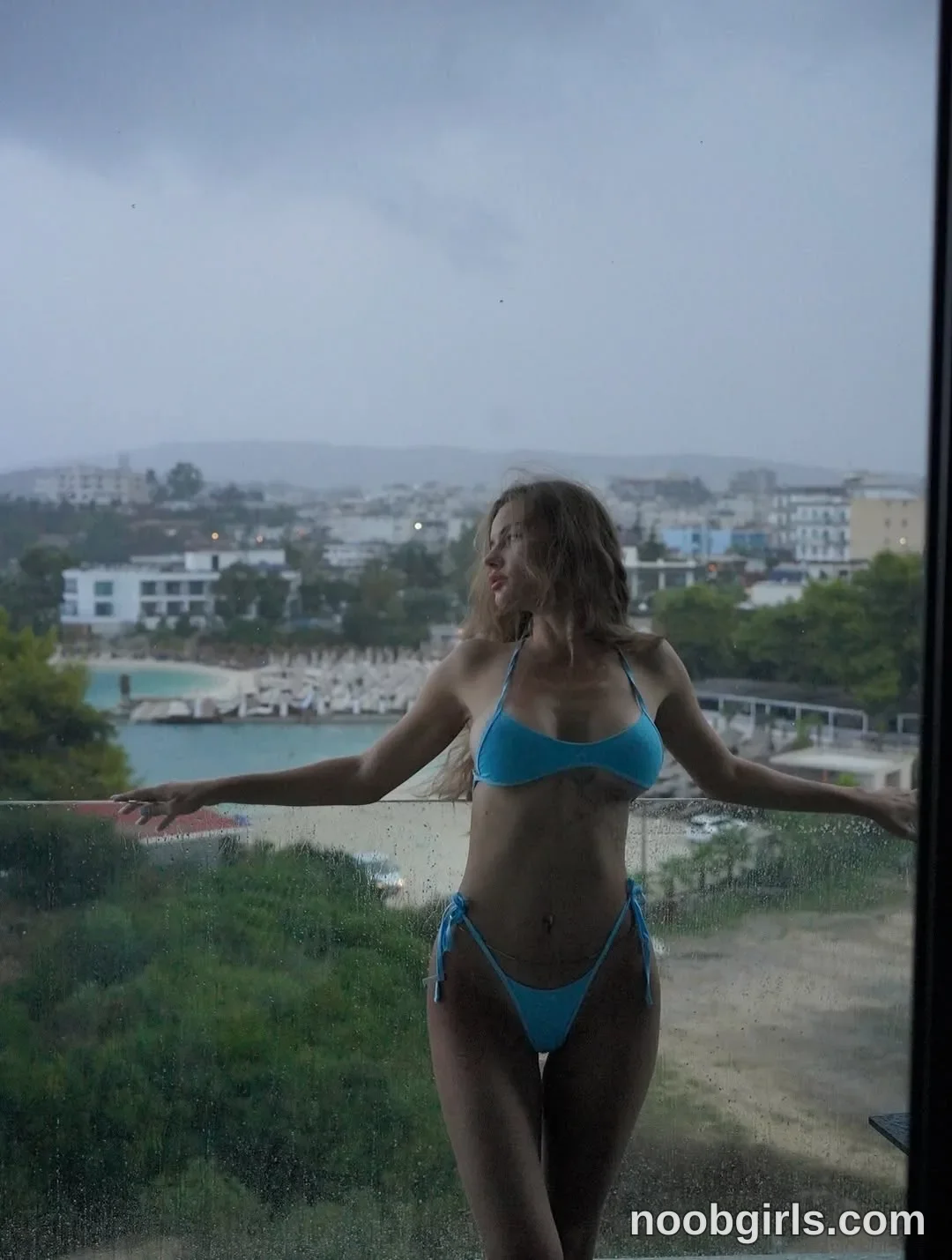Ana Michelle (@michellesbate) — "A little bit of sun, a little bit of trouble.🩵"