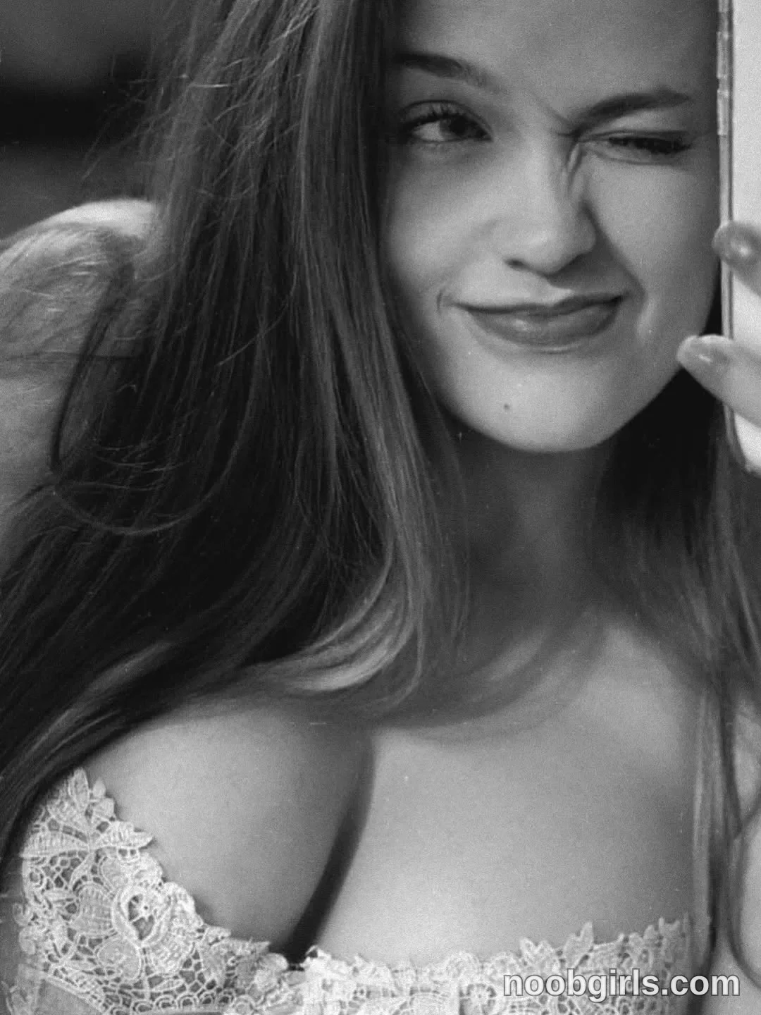 mode_bad winking wearing lace corset or bra