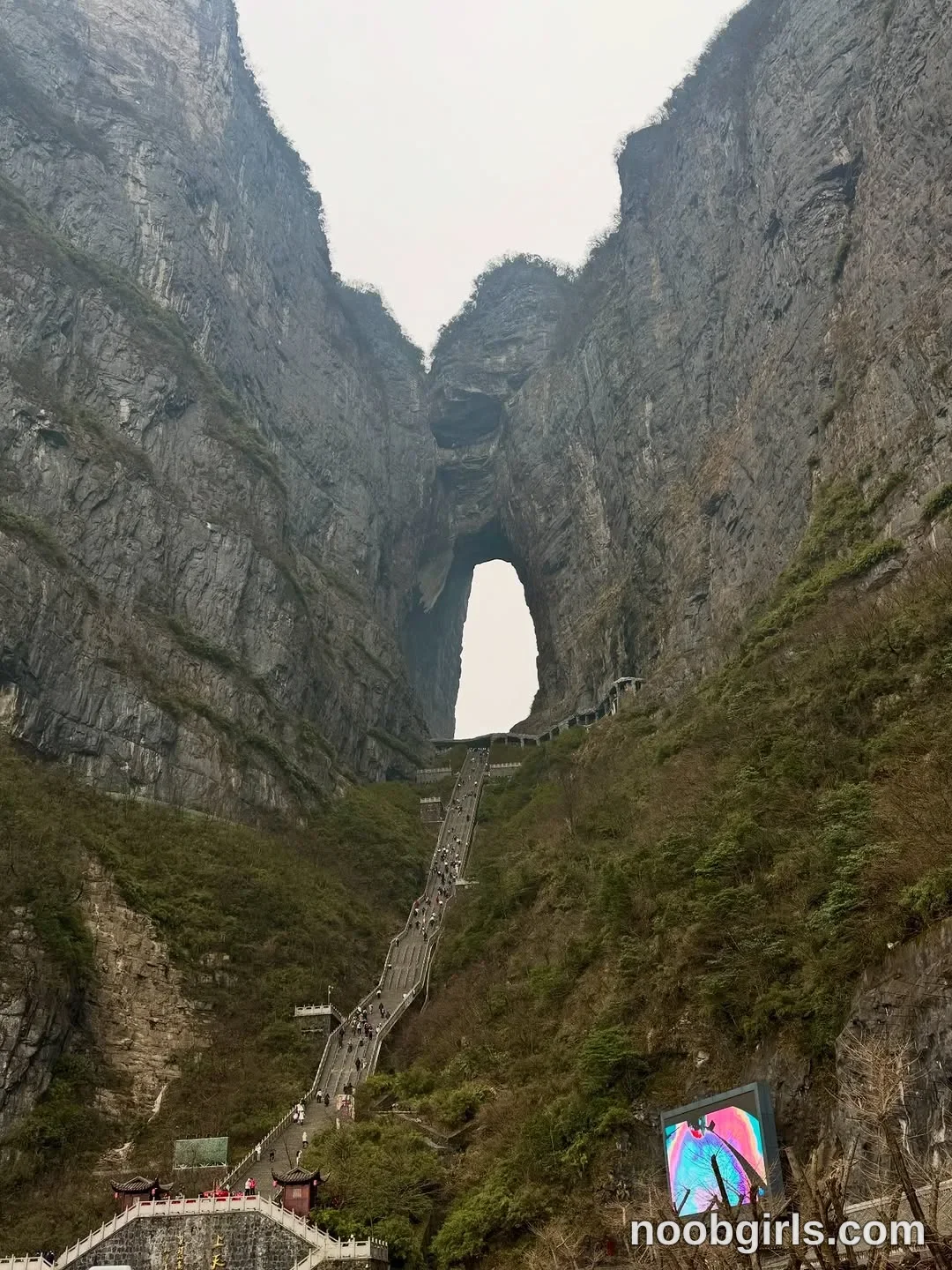 Elina none (no focal subject/model visible in frame) in mountain cliff in Tianmenshan National Park