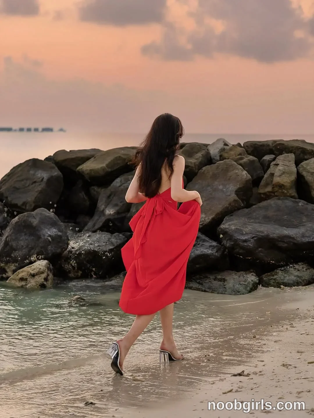 TAANNI (@taanni_bc) — "Lady in Red 🍒 Made this beach even more beautiful"