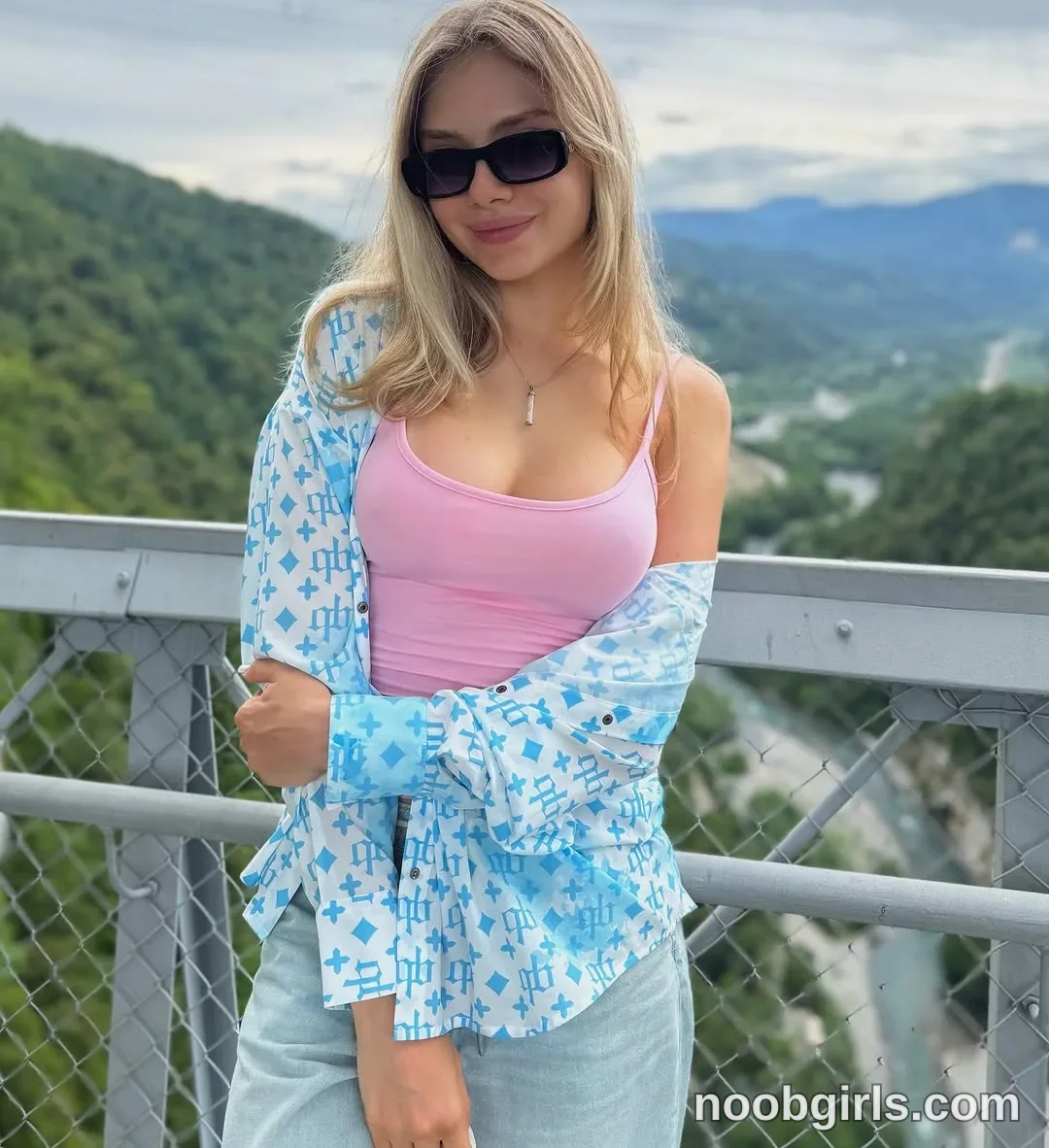 tastypoint wearing black rectangular sunglasses